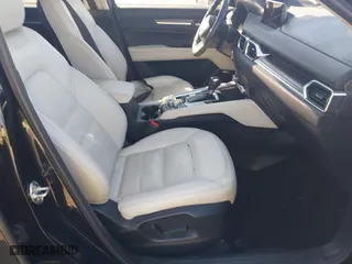 2019 Mazda CX-5 Grand Touring with VIN JM3KFBDM2K0603297, listed as a IAAI auction lot 41668241 with 54,583 mi miles. Bid and sale history available at carsss.com. Image 5.