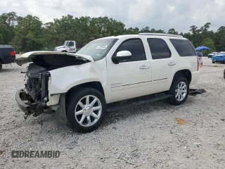 2011 GMC Yukon Denali with VIN 1GKS2EEF0BR378125, listed as a Copart auction lot 72920364 with 148,080 mi miles and Salvage Title. Bid and sale history available at carsss.com. Image 1.