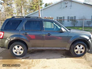 2009 Ford Escape XLT with VIN 1FMCU03709KB87490, listed as a IAAI auction lot 41989526 with 186,207 mi miles. Bid and sale history available at carsss.com. Image 13.