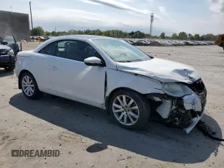 2011 Volkswagen Eos with VIN WVWAW7AH7BV003659, listed as a Copart auction lot 52494904 with 122,927 mi miles and Salvage Title. Bid and sale history available at DreamBid. Image 4.