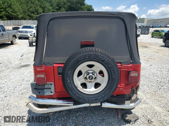 2001 Jeep Wrangler Sport with VIN 1J4FA49S51P365327, listed as a Copart auction lot 61720115 with 194,086 mi miles and Salvage title. Bid and sale history available at DreamBid. Image 6.