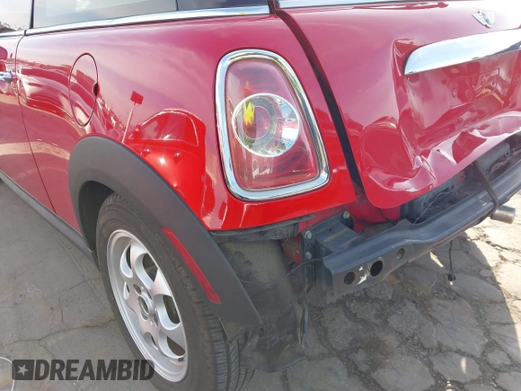 2012 MINI Hardtop with VIN WMWSU3C55CT541177, listed as a IAAI auction lot 41608998 with 123,930 mi miles and . Bid and sale history available at DreamBid. Image 13.