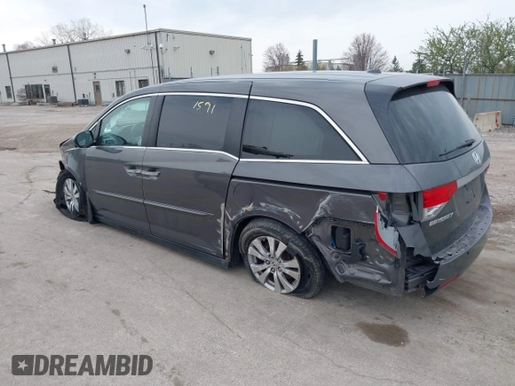 2014 Honda Odyssey EX-L with VIN 5FNRL5H62EB006346, listed as a IAAI auction lot 42061591 with 179,994 mi miles and . Bid and sale history available at DreamBid. Image 3.