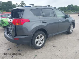 2013 Toyota RAV4 XLE with VIN JTMRFREV8DD016220, listed as a IAAI auction lot 42442403 with 165,364 mi miles and . Bid and sale history available at DreamBid. Image 4.