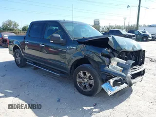 2015 Ford F-150 XL with VIN 1FTEW1CPXFFC36244, listed as a IAAI auction lot 41536223 with 122,351 mi miles. Bid and sale history available at carsss.com. Image 1.