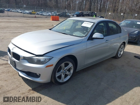 2012 BMW 3 Series 328i with VIN WBA3A5C59CF349364, listed as a IAAI auction lot 41764345 with 187,221 mi miles and . Bid and sale history available at carsss.com. Image 2.