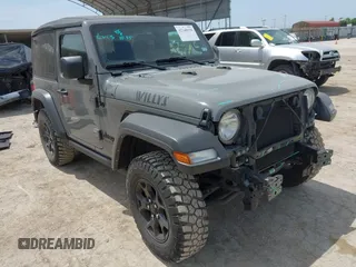 2022 Jeep Wrangler Sport S z VIN 1C4GJXAG8NW232480, wystawiony jako IAAI lot #42248150 z przebiegiem 23 918 mil mil oraz . Historia ofert i sprzedaży dostępna na DreamBid. Obrazek 1.