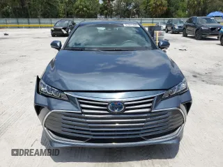 2021 Toyota Avalon Hybrid XLE z VIN 4T1AA1AB8MU007487, wystawiony jako Copart lot #57241445 z przebiegiem 63 154 mil mil oraz Nie do naprawy • Non repairable. Historia ofert i sprzedaży dostępna na DreamBid. Obrazek 5.