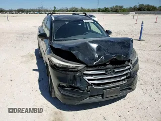 2017 Hyundai Tucson SE with VIN KM8J33A40HU409713, listed as a Copart auction lot 50105805 with 100,463 mi miles and Salvage Title. Bid and sale history available at DreamBid. Image 12.