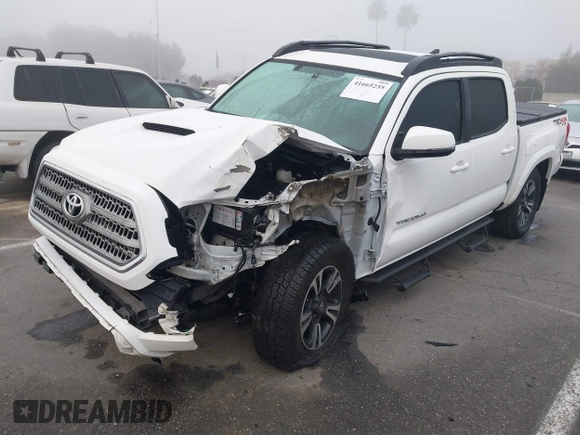 2016 Toyota Tacoma SR with VIN 3TMCZ5AN0GM030469, listed as a IAAI auction lot 41665255 with 178,591 mi miles and . Bid and sale history available at carsss.com. Image 19.