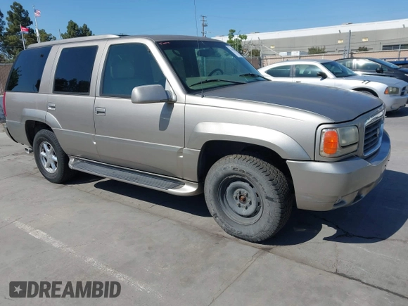 1999 Cadillac Escalade z VIN 1GYEK13R4XR419503, wystawiony jako IAAI lot #42215638 z przebiegiem 174 381 mil mil oraz . Historia ofert i sprzedaży dostępna na DreamBid. Obrazek 1.