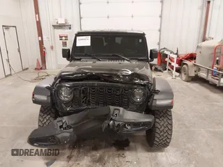2024 Jeep Wrangler Sport S with VIN 1C4PJXDG4RW218996, listed as a IAAI auction lot 42088856 with 10,717 mi miles and . Bid and sale history available at DreamBid. Image 6.