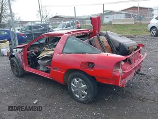 1992 Mitsubishi Eclipse with VIN 4A3CS34T2NE089042, listed as a IAAI auction lot 40436013 with Not Provided miles and . Bid and sale history available at DreamBid. Image 3.