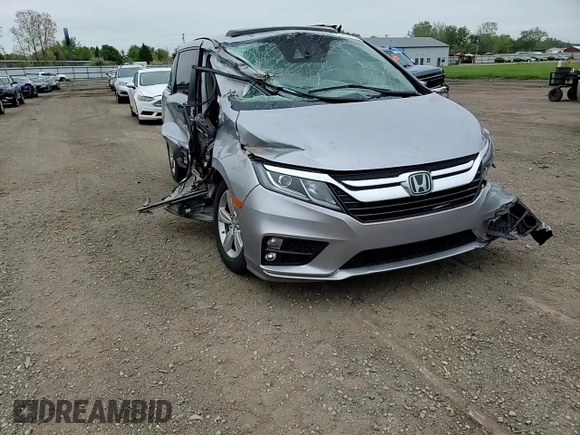 2019 Honda Odyssey EX-L z VIN 5FNRL6H7XKB049729, wystawiony jako Copart lot #55953075 z przebiegiem 129 194 mil mil oraz Szkoda całkowita • Salvage title. Historia ofert i sprzedaży dostępna na DreamBid. Obrazek 14.