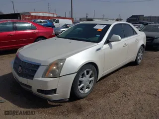 2009 Cadillac CTS AWD w/1SA with VIN 1G6DG577090138683, listed as a IAAI auction lot 41609963 with 212,178 mi miles. Bid and sale history available at carsss.com. Image 2.