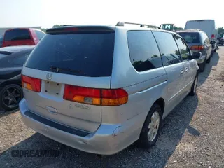 2003 Honda Odyssey EX z VIN 5FNRL18613B111952, wystawiony jako IAAI lot #40852383 z przebiegiem Nie podano mil oraz . Historia ofert i sprzedaży dostępna na DreamBid. Obrazek 4.