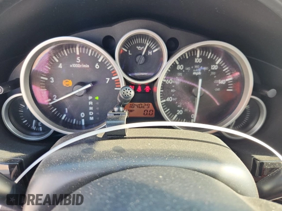2007 Mazda MX-5 Miata Touring with VIN JM1NC25F770138120, listed as a Copart auction lot 60777425 with 184,029 mi miles and Salvage title. Bid and sale history available at DreamBid. Image 9.