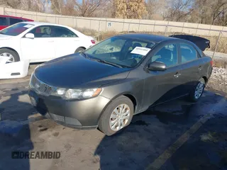 2011 Kia Forte EX with VIN KNAFU4A25B5358977, listed as a IAAI auction lot 40992404 with 137,478 mi miles. Bid and sale history available at carsss.com. Image 2.
