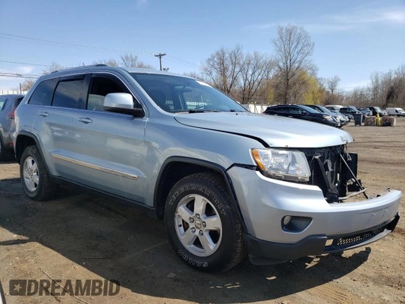 2012 Jeep Grand Cherokee Laredo with VIN 1C4RJFAG5CC222569, listed as a Copart auction lot 53264185 with 153,921 mi miles and Salvage Title. Bid and sale history available at carsss.com. Image 4.