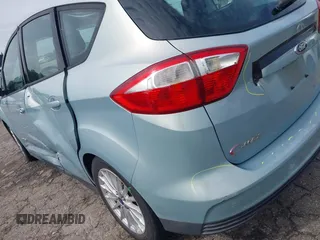 2013 Ford C-Max SE z VIN 1FADP5AU4DL511362, wystawiony jako IAAI lot #42073682 z przebiegiem 160 960 mil mil oraz . Historia ofert i sprzedaży dostępna na DreamBid. Obrazek 13.