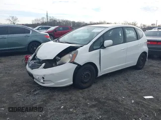 2013 Honda Fit with VIN JHMGE8H39DC005052, listed as a IAAI auction lot 41008236 with 124,874 mi miles. Bid and sale history available at carsss.com. Image 17.