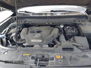 2021 Mazda CX-9 Sport with VIN JM3TCBBY7M0520437, listed as a IAAI auction lot 42022562 with 77,063 mi miles and . Bid and sale history available at DreamBid. Image 10.