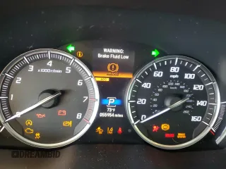 2019 Acura MDX Technology z VIN 5J8YD3H50KL001807, wystawiony jako Copart lot #87128534 z przebiegiem 55 954 mil mil oraz Nie do naprawy • Non repairable. Historia ofert i sprzedaży dostępna na DreamBid. Obrazek 9.