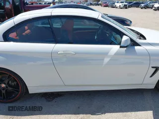 2015 BMW 4 Series 428i z VIN WBA3V7C52FP771779, wystawiony jako IAAI lot #41953647 z przebiegiem 66 003 mil mil oraz . Historia ofert i sprzedaży dostępna na DreamBid. Obrazek 13.