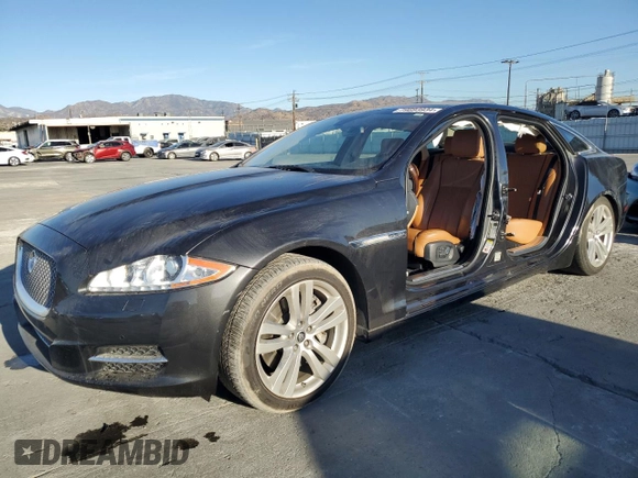 2013 Jaguar XJ with VIN SAJWA2GB0DLV43865, listed as a Copart auction lot 79693934 with 0 mi miles and Salvage Title. Bid and sale history available at carsss.com. Image 1.
