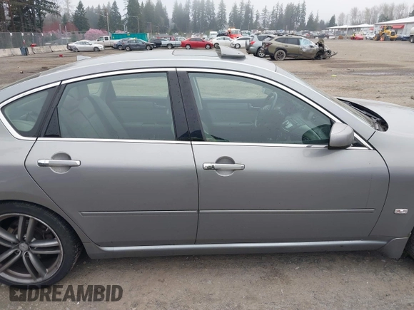 2007 Infiniti M Sport z VIN JNKAY01EX7M302565, wystawiony jako IAAI lot #41885272 z przebiegiem 151 745 mil mil oraz . Historia ofert i sprzedaży dostępna na DreamBid. Obrazek 13.