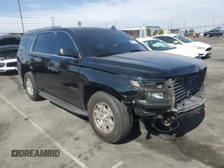 2018 Chevrolet Tahoe LS with VIN 1GNSCAKC9JR201994, listed as a Copart auction lot 53100735 with 182,460 mi miles and Salvage title. Bid and sale history available at DreamBid. Image 4.