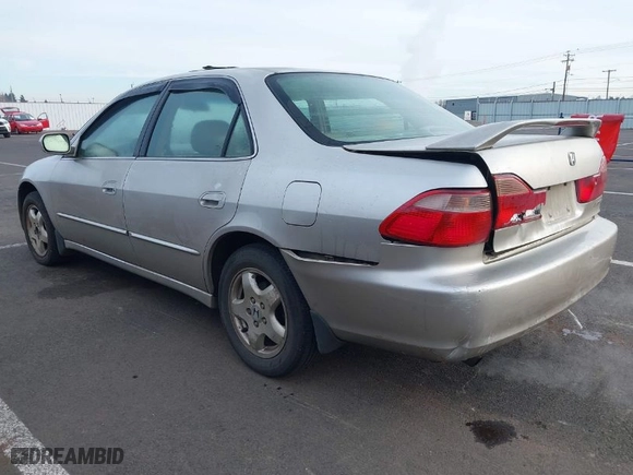 1999 Honda Accord Sdn EX with VIN 1HGCG1652XA037252, listed as a IAAI auction lot 41383142 with 319683 miles. Bid and sale history available at carsss.com. Image 3.