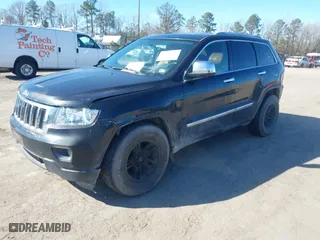 2011 Jeep Grand Cherokee Laredo with VIN 1J4RR4GG2BC585859, listed as a IAAI auction lot 41901919 with 272,585 mi miles. Bid and sale history available at carsss.com. Image 2.