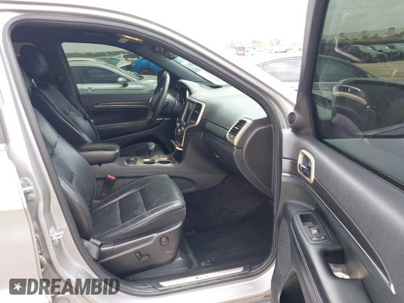 2014 Jeep Grand Cherokee Limited with VIN 1C4RJFBGXEC264334, listed as a IAAI auction lot 42127743 with 175,798 mi miles and . Bid and sale history available at DreamBid. Image 5.