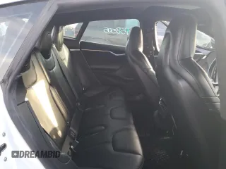 2016 Tesla Model S 90D with VIN 5YJSA1E24GF158505, listed as a Copart auction lot 87681485 with 91,225 mi miles and Salvage title. Bid and sale history available at DreamBid. Image 11.