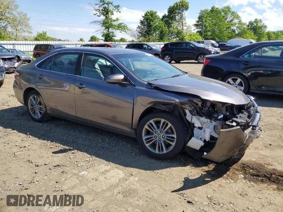 2015 Toyota Camry XLE with VIN 4T1BF1FK7FU069352, listed as a Copart auction lot 56123125 with 137,244 mi miles and Salvage Title. Bid and sale history available at DreamBid. Image 4.