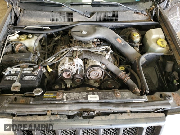 1998 Jeep Grand Cherokee Limited z VIN 1J4GZ88Z0WC276394, wystawiony jako Copart lot #46702355 z przebiegiem 144 232 mil mil oraz Szkoda całkowita • Salvage title. Historia ofert i sprzedaży dostępna na DreamBid. Obrazek 11.