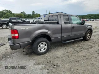 2005 Ford F-150 STX with VIN 1FTRX12W55FB32573, listed as a Copart auction lot 59602715 with 238,701 mi miles and Salvage title. Bid and sale history available at DreamBid. Image 3.