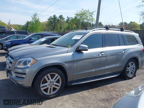 2014 Mercedes-Benz GL 450 with VIN 4JGDF7CE0EA290673, listed as a IAAI auction lot 42207889 with 132,251 mi miles and . Bid and sale history available at DreamBid. Image 14.