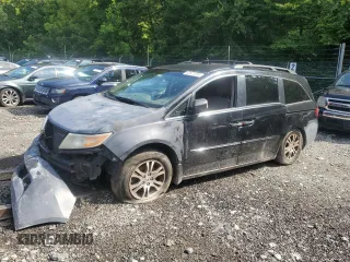 2005 Honda Odyssey EX-L with VIN 5FNRL38705B125669, listed as a Copart auction lot 62695515 with Not provided miles and Salvage title. Bid and sale history available at DreamBid. Image 1.