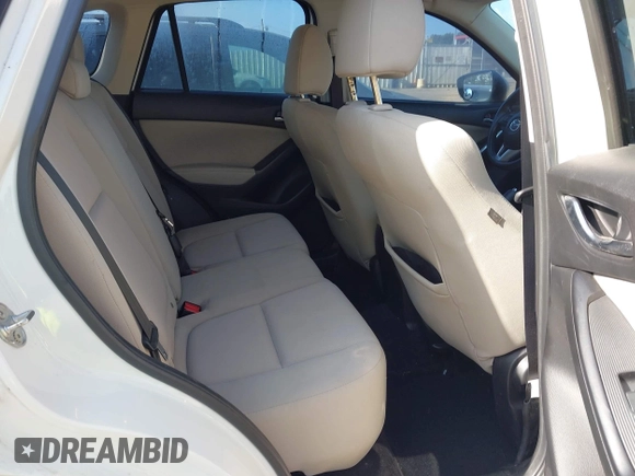 2015 Mazda CX-5 Sport with VIN JM3KE2BE6F0541469, listed as a IAAI auction lot 42632906 with 166,257 mi miles and . Bid and sale history available at DreamBid. Image 8.