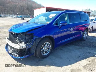 2021 Chrysler Pacifica Touring with VIN 2C4RC1FG5MR511546, listed as a IAAI auction lot 41882085 with 85,635 mi miles and . Bid and sale history available at DreamBid. Image 2.