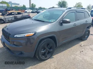 2016 Jeep Cherokee Latitude with VIN 1C4PJMCBXGW122274, listed as a IAAI auction lot 42407175 with 152,229 mi miles and . Bid and sale history available at DreamBid. Image 17.