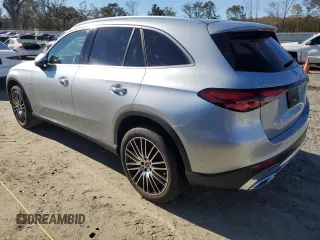 2023 Mercedes-Benz GLC with VIN W1NKM4GB3PF002580, listed as a Copart auction lot 82312704 with 0 mi miles and Salvage Title. Bid and sale history available at carsss.com. Image 2.