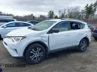 2018 Toyota RAV4 LE with VIN JTMBFREV5JJ738405, listed as a IAAI auction lot 41956145 with 100,593 mi miles and . Bid and sale history available at DreamBid. Image 6.