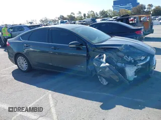 2015 Ford Fusion SE Hybrid with VIN 3FA6P0LU4FR306928, listed as a IAAI auction lot 41826720 with 83,983 mi miles. Bid and sale history available at carsss.com. Image 13.