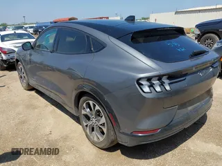 2023 Ford Mustang Mach-E Premium z VIN 3FMTK3SU3PMA83287, wystawiony jako IAAI lot #42329691 z przebiegiem Nie podano mil oraz . Historia ofert i sprzedaży dostępna na DreamBid. Obrazek 3.