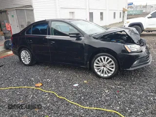 2016 Volkswagen Jetta Sedan 1.8T SEL with VIN 3VWL17AJ6GM380816, listed as a IAAI auction lot 41617737 with 158,427 mi miles. Bid and sale history available at carsss.com. Image 1.