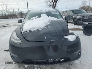 2021 Tesla Model Y Standard Range z VIN 5YJYGDED3MF120514, wystawiony jako Copart lot #46156775 z przebiegiem 93 470 mil mil oraz Szkoda całkowita • Salvage title. Historia ofert i sprzedaży dostępna na DreamBid. Obrazek 5.