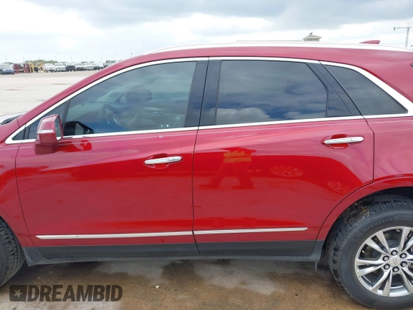 2020 Cadillac XT5 Premium Luxury FWD z VIN 1GYKNCRS8LZ228516, wystawiony jako IAAI lot #42409513 z przebiegiem 54 765 mil mil oraz . Historia ofert i sprzedaży dostępna na DreamBid. Obrazek 14.